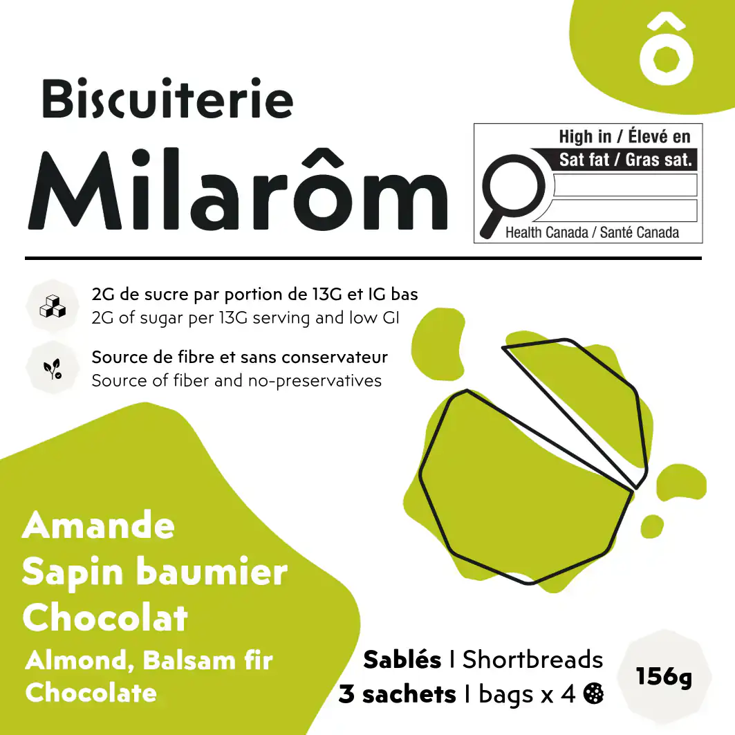 Cette image montre l'étiquette avant de notre boîte de 12 biscuits sablés à la noisette, avoine et chocolat ; nous avons choisi une couleur vert clair pour ce produit, en rappel des jeunes pousses de sapin baumier